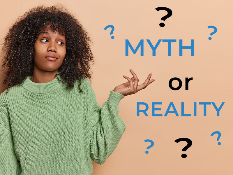 Lady pointing to hair myth or reality with question marks